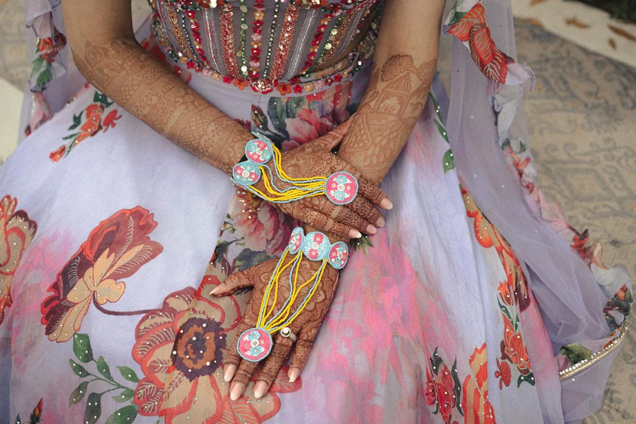 Mehendi and bridal accessory detail shot